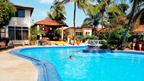 Hotel African Village – bestil nemt og bekvemt hos Spies